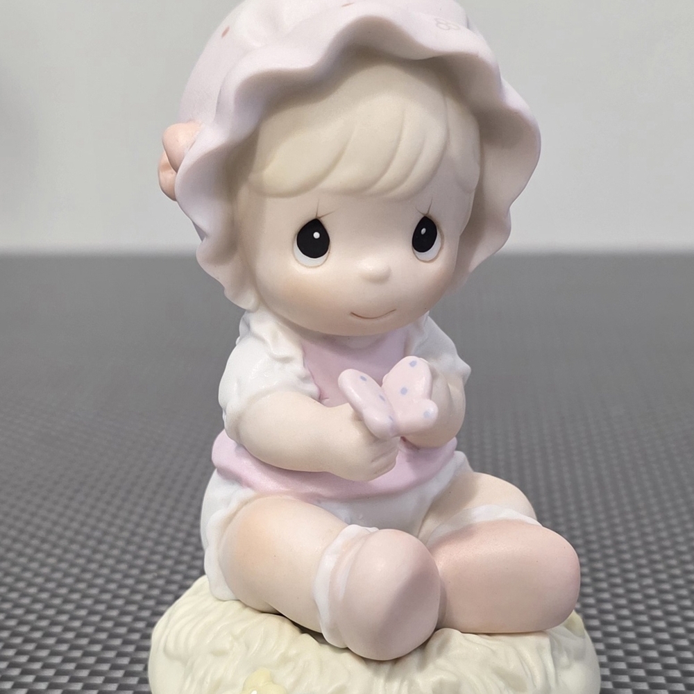 Precious Moments Pink and White Figurine